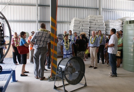 Clinton Chapman explains the new facility to guests at the opening