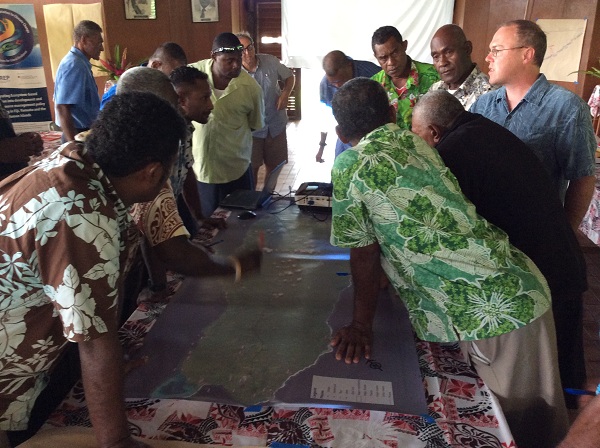 The workshop participants during a mapping exercise on natural solutions to climate change