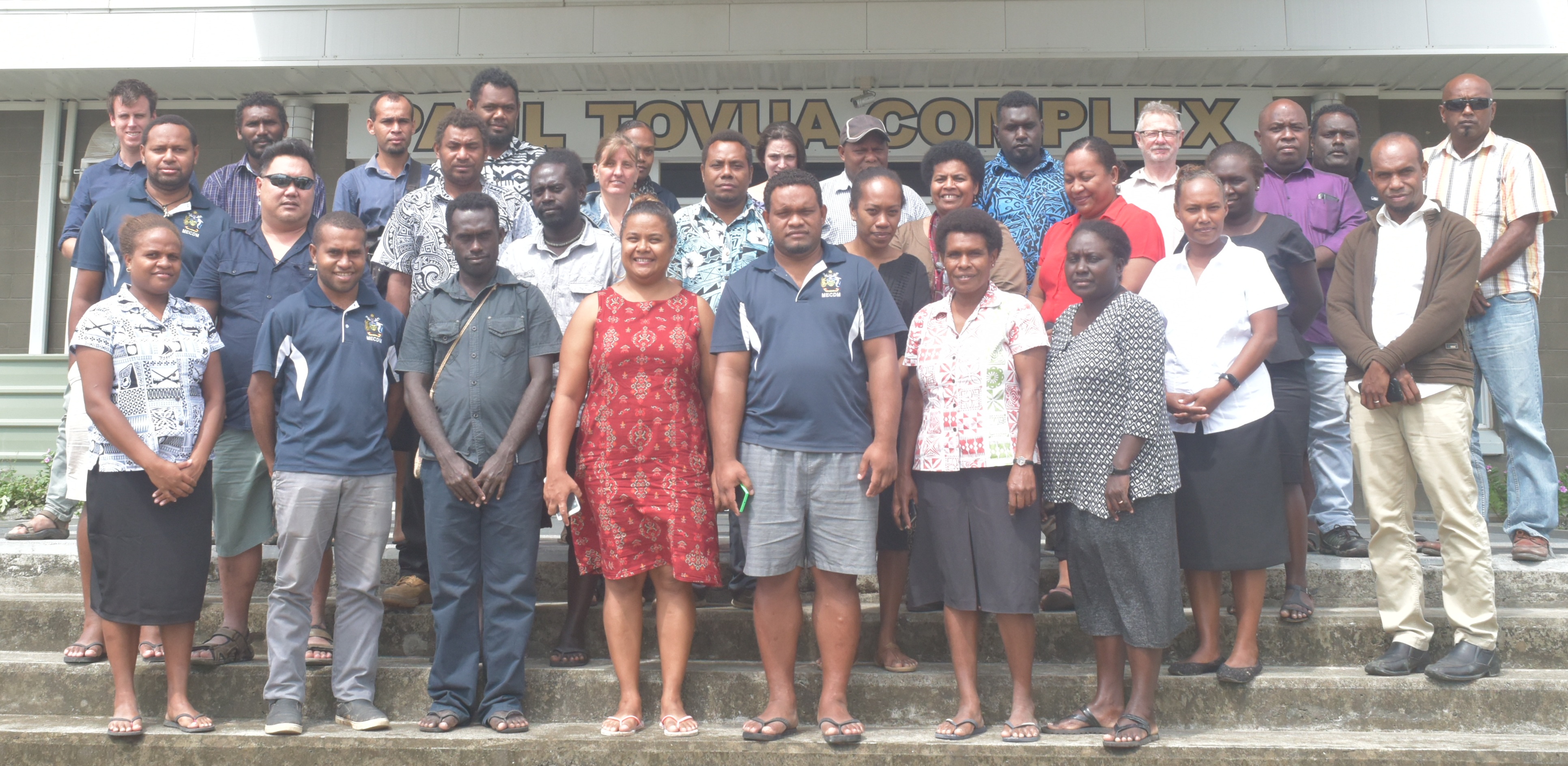 Group photo with 68 attendees at the event