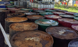 Stockpile of used oil containers 