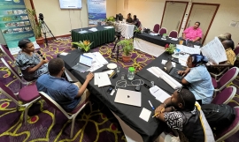 Stakeholders reviewing the Sarakata River Plan