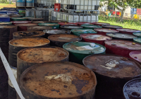 Stockpile of used oil containers 