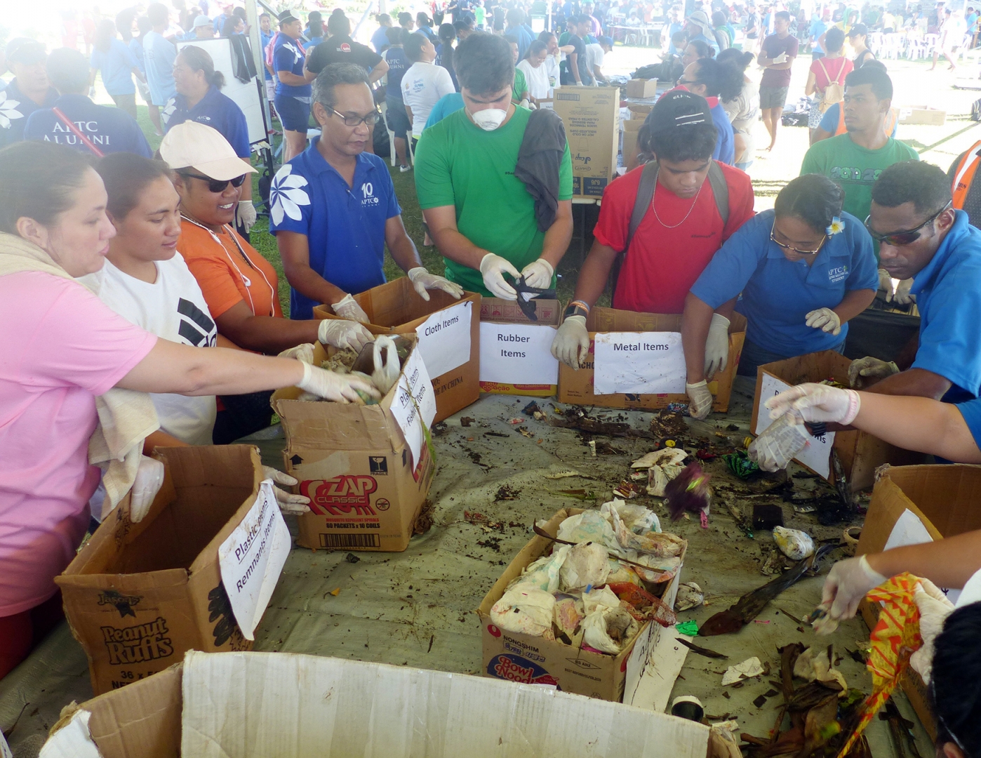 Rubbish sorting after river clean-up