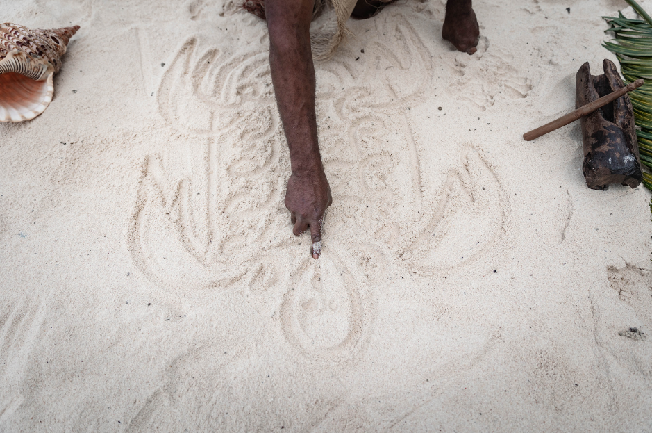 Drawing of turtle on sand